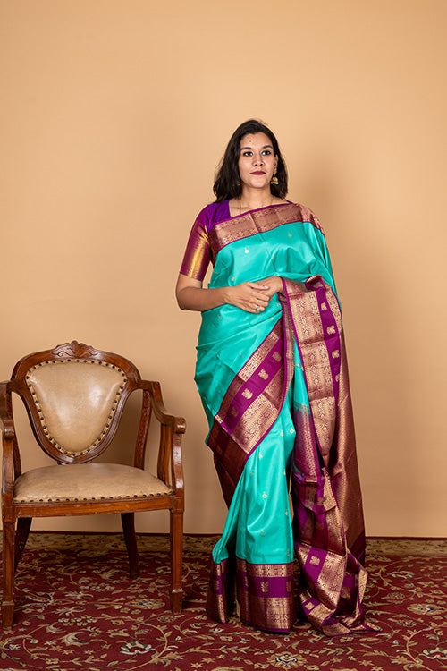 Aqua green soft silk saree