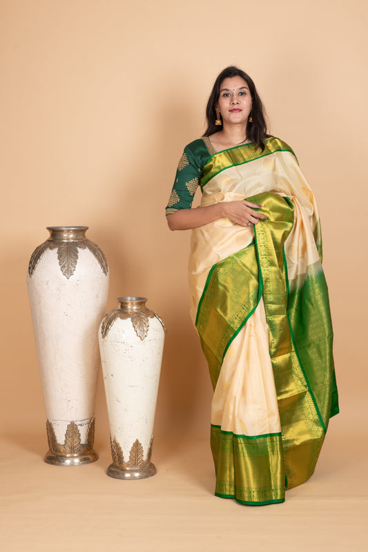 Parchment White and Emerald Green pure Kanjivaram Silk Saree