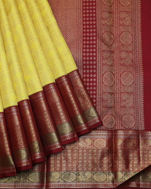Lemon yellow and Maroon pure zari silk saree