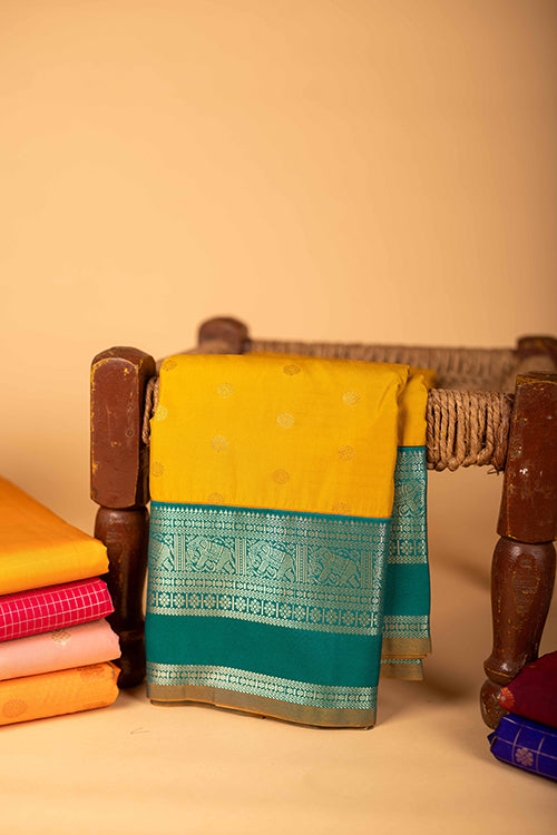 Mustard And Blue Semi Silk Saree