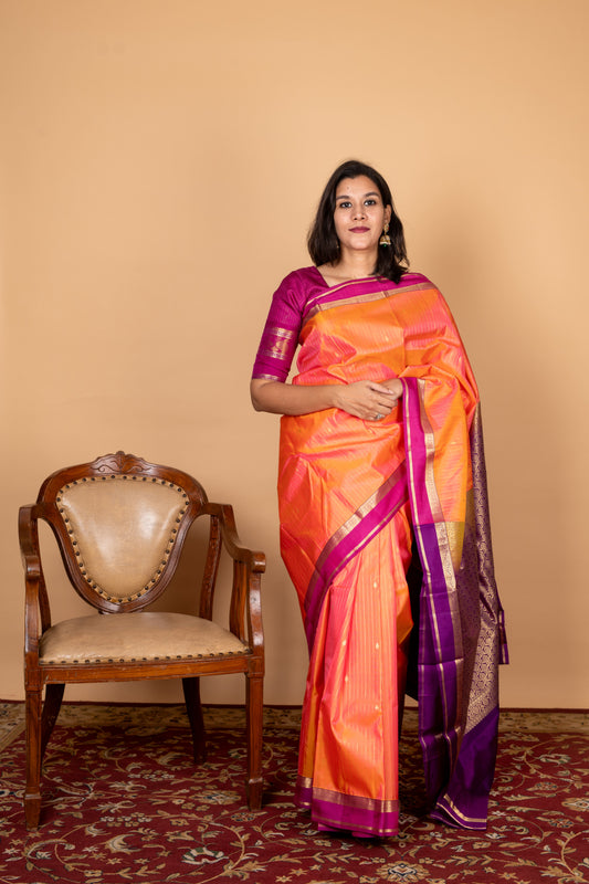 Dual tone orange small border silk saree