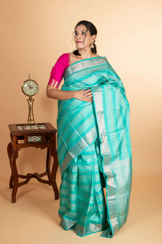 Turqouise Multistrip pure silk saree