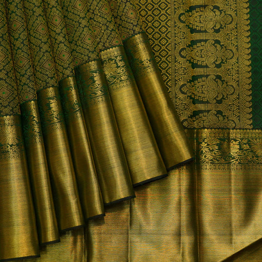 Dark green pattu saree for wedding