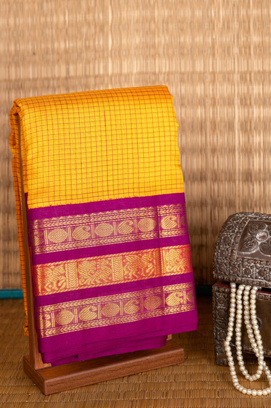 Yellow and purple silk cotton saree
