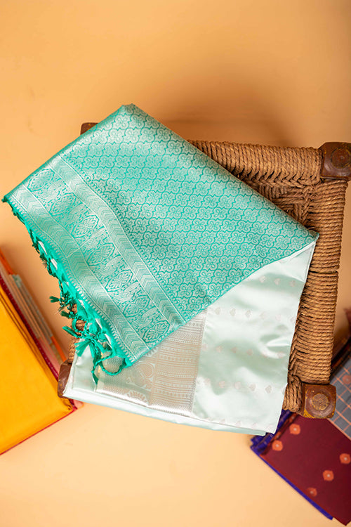 Pastel green and green semi soft silk saree