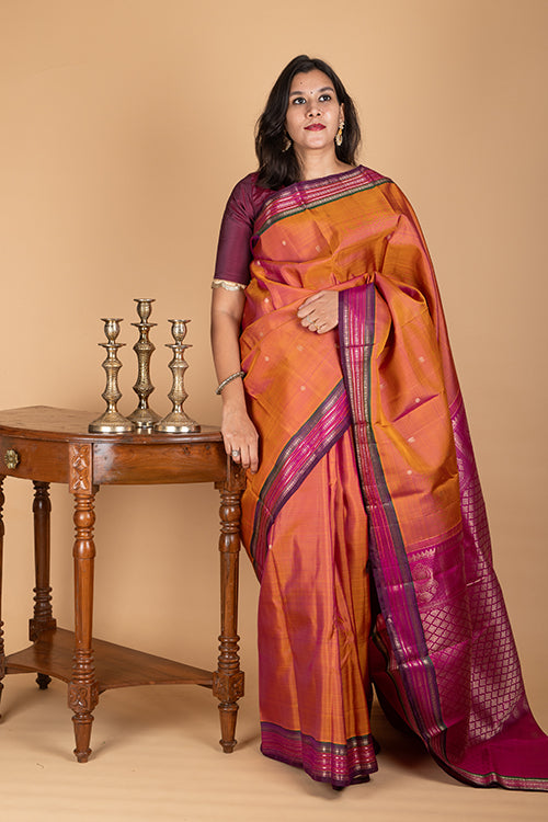 Rust and purple pure kanjivaram silk saree