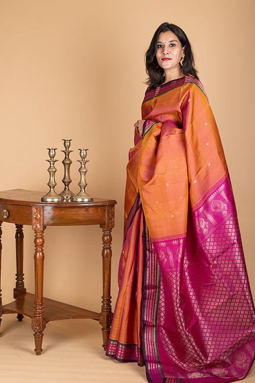 Rust and purple pure kanjivaram silk saree