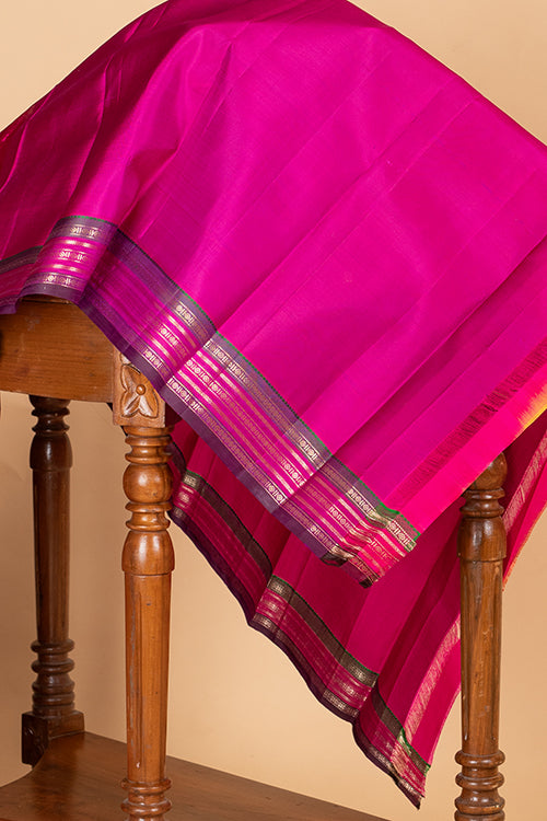 Rust and purple pure kanjivaram silk saree