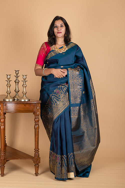 Peacock blue turning border silk saree