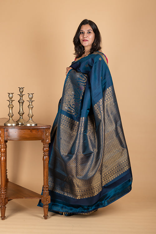 Peacock blue turning border silk saree