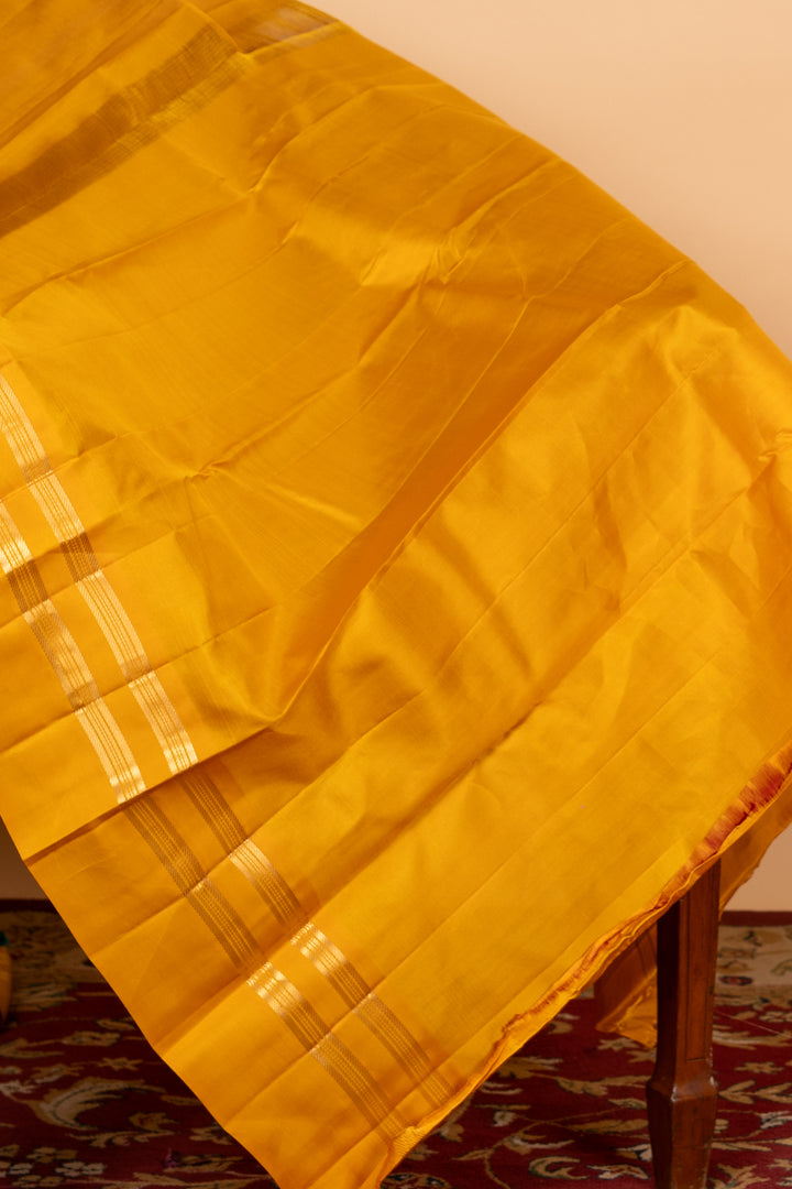 Yellow and Blue Kanchipuram Silk Saree
