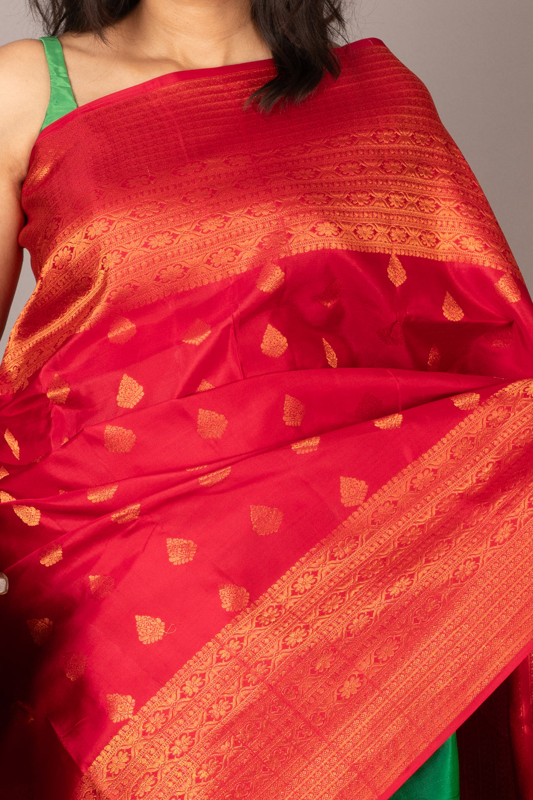 Red and green small border silk saree
