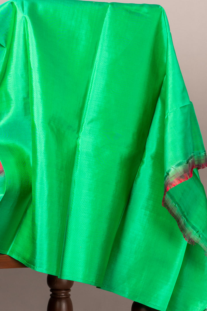 Red and green small border silk saree