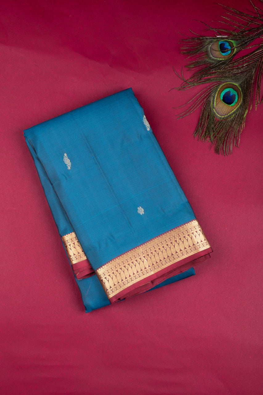 Peacock blue and maroon small border silk saree