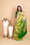 Parchment White and Emerald Green pure Kanjivaram Silk Saree