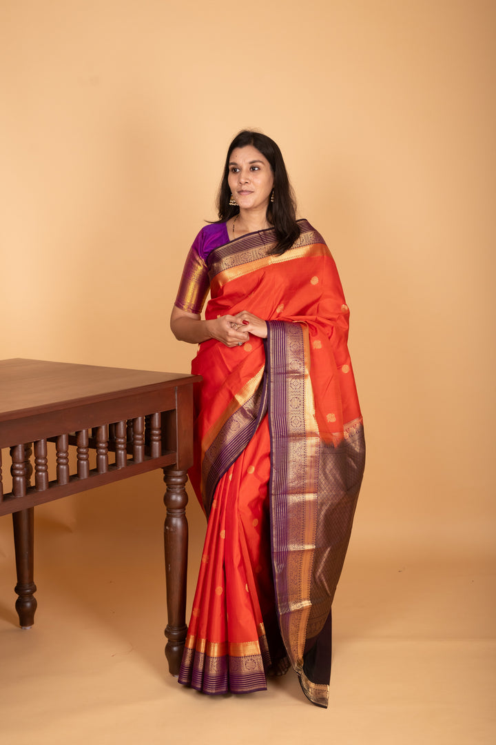Pumpkin orange and Eggplant Purple Butta weave kanchi pure silk saree