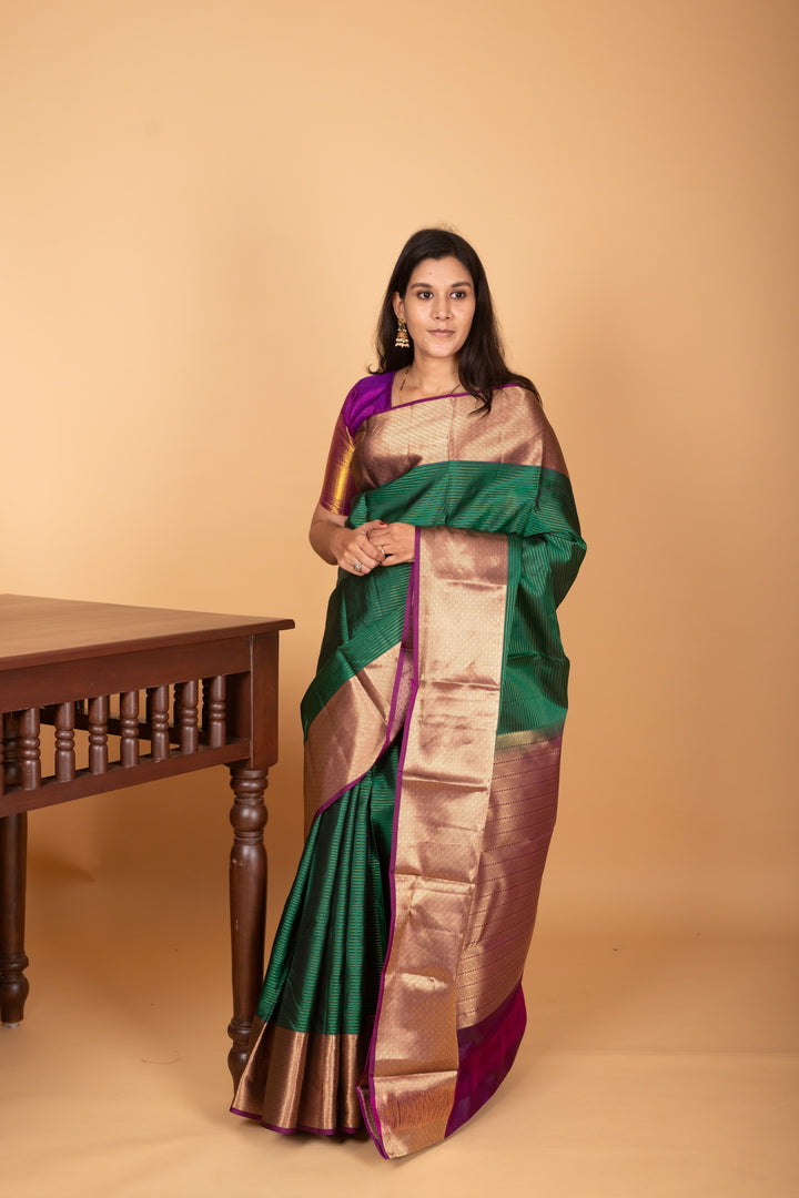 Emerald green and Mulberry Purple Vaira oosi pure kanjivaram silk saree