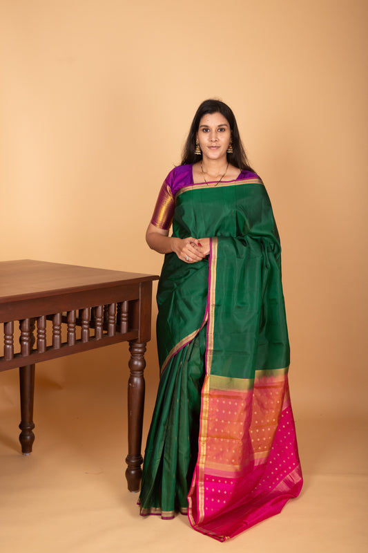 Bottle Green and Rani pink partly pleats pure kanjivaram silk saree