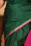 Bottle Green and Rani pink partly pleats pure kanjivaram silk saree
