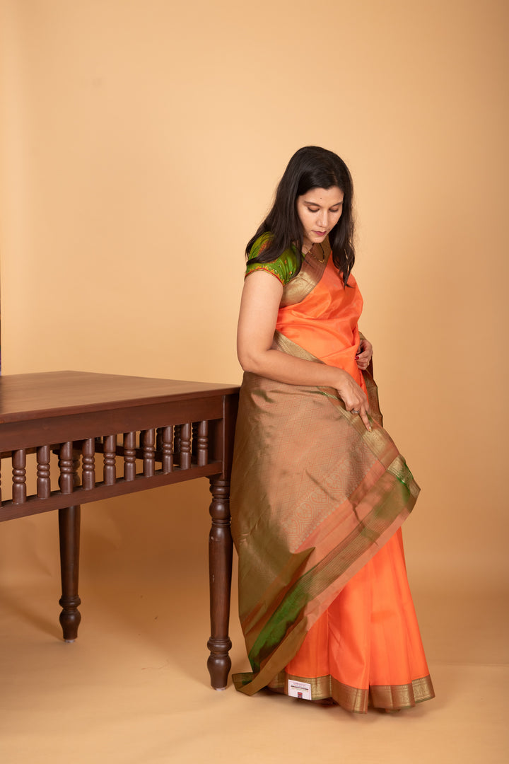 Coral Orange and Dual Tone Green zero zari pure kanchi silk saree