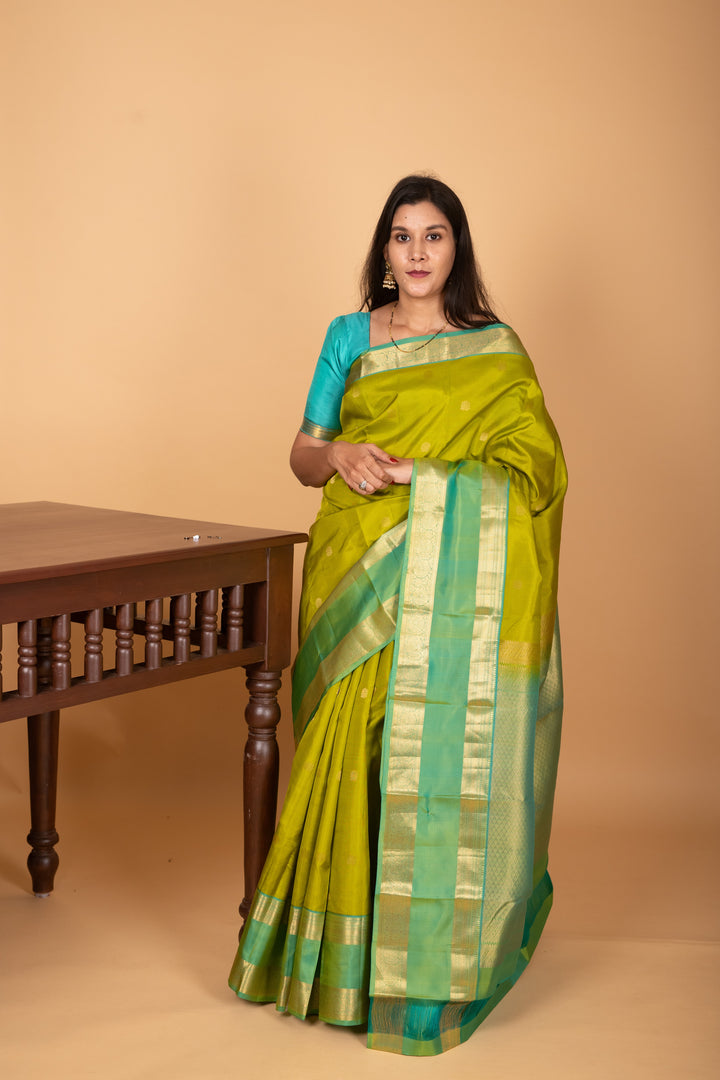 Apple Green and Dual Tone Blue Butta Pure kanchi silk saree