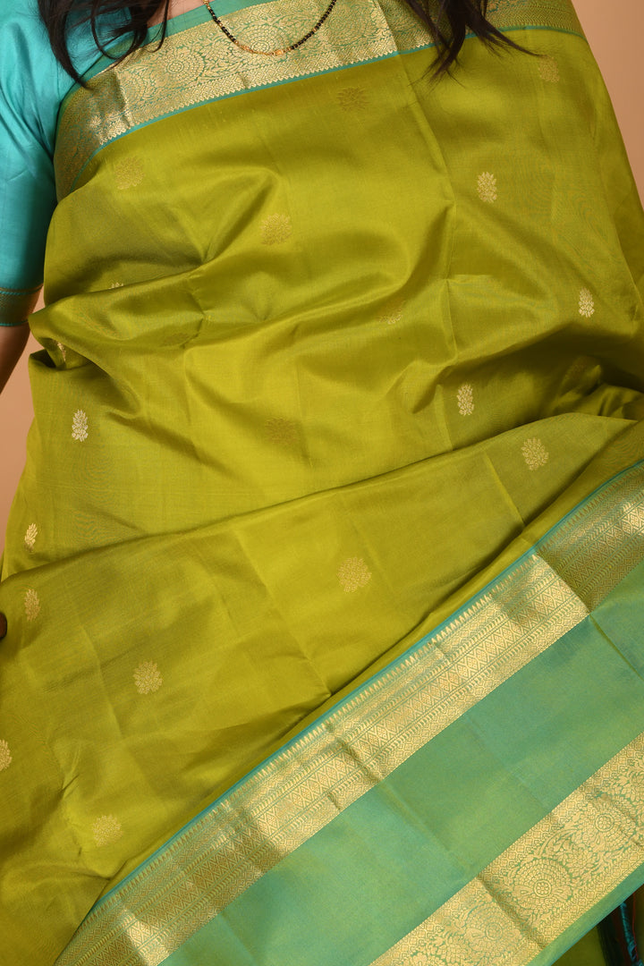 Apple Green and Dual Tone Blue Butta Pure kanchi silk saree