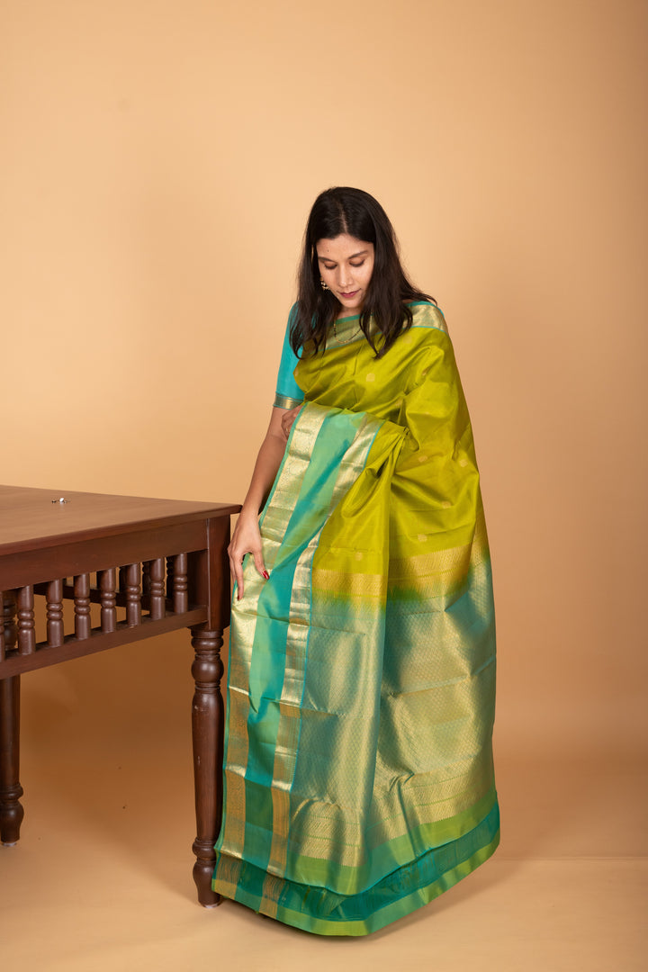 Apple Green and Dual Tone Blue Butta Pure kanchi silk saree