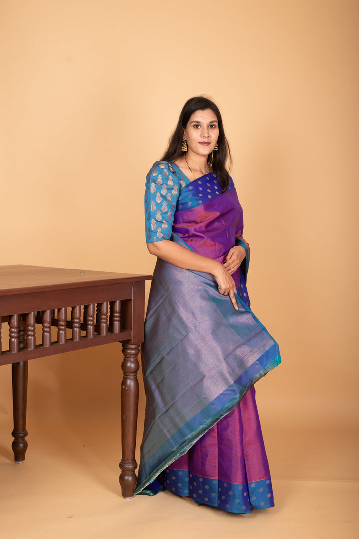 Dual Tone Purple and Peacock Blue zari striped pure kanchi silk saree