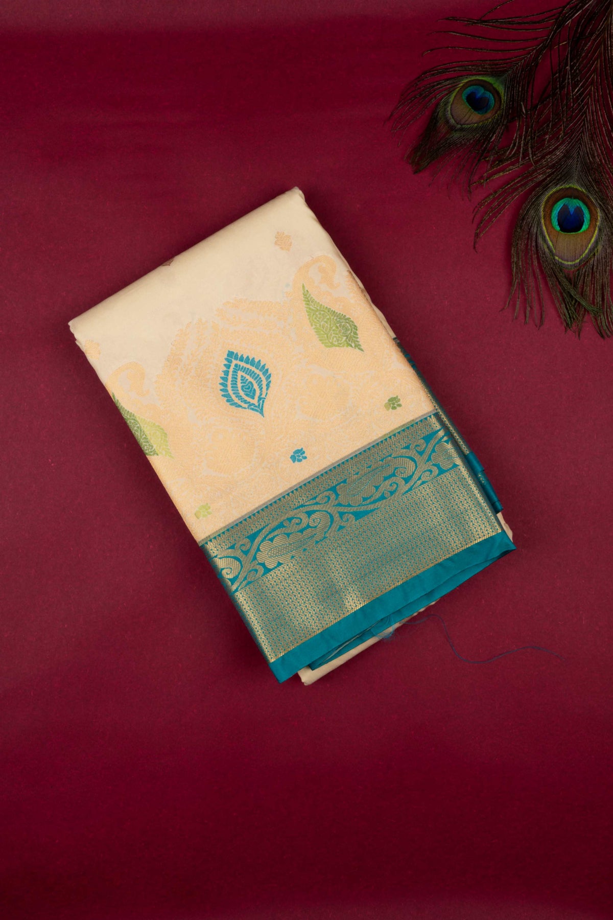 Offwhite Teal Semi Silk Saree