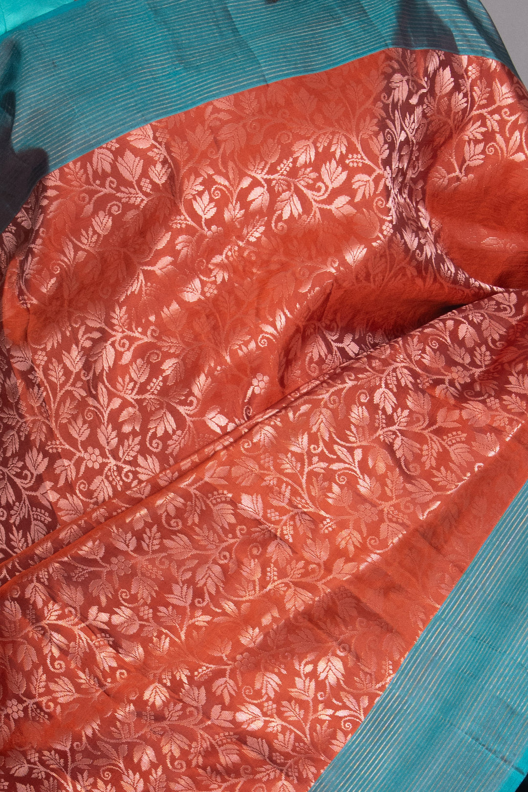 Clay Orange And Teal Pure Soft Silk Saree