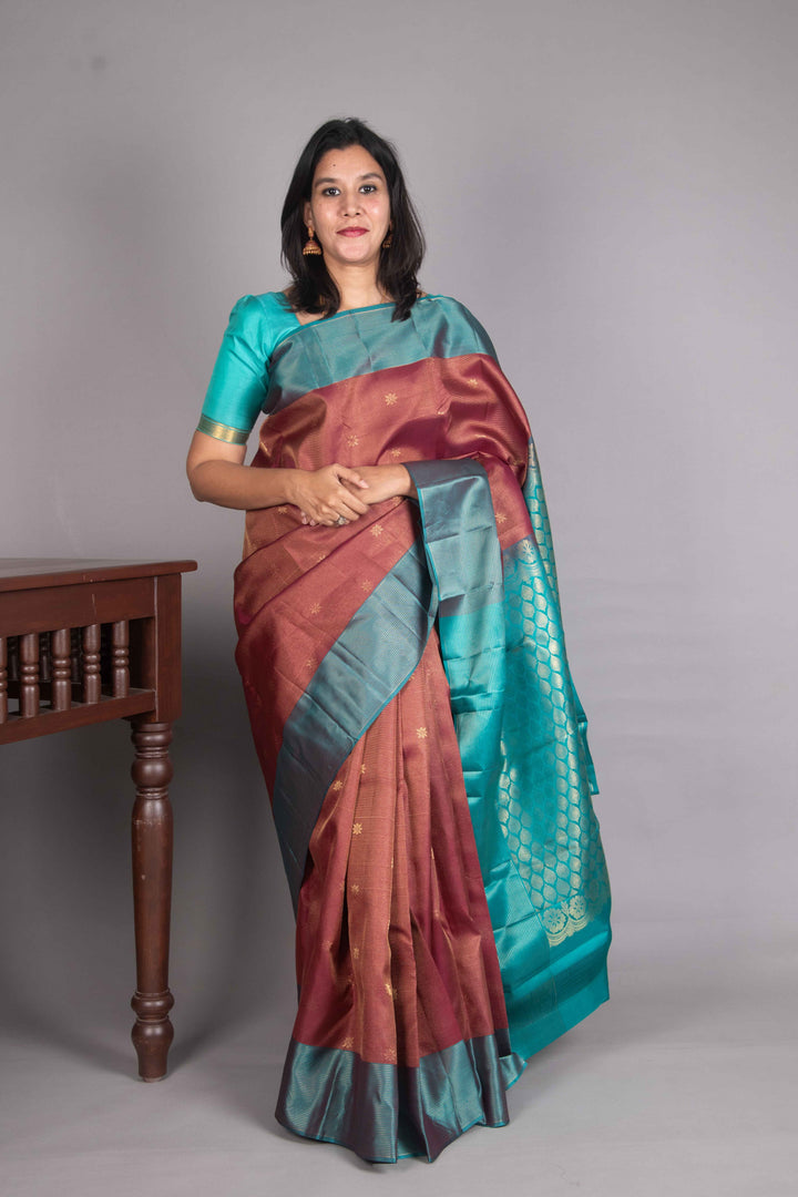Maroon And Teal Vairaoosi Silk Saree