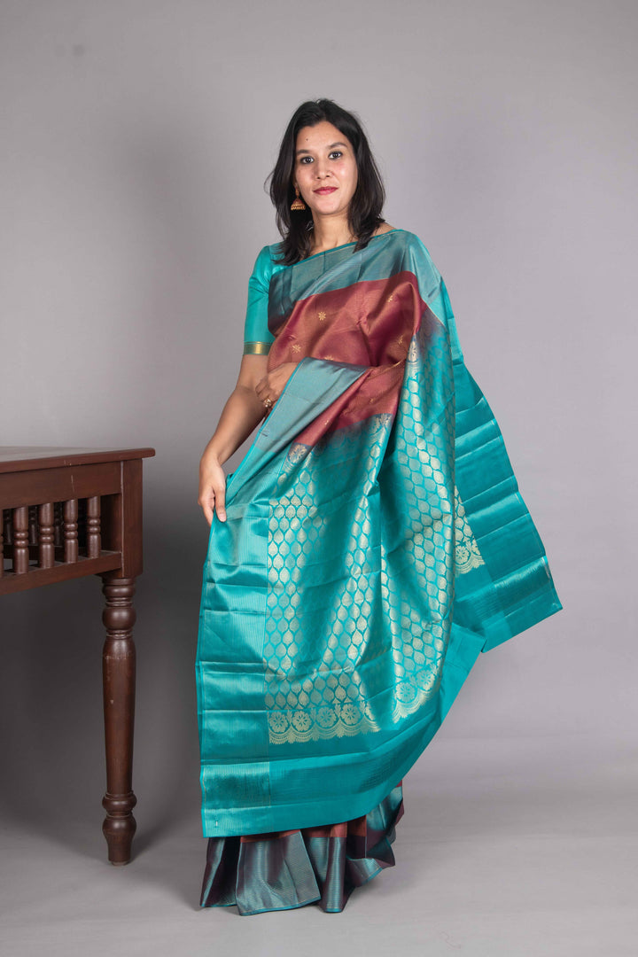Maroon And Teal Vairaoosi Silk Saree