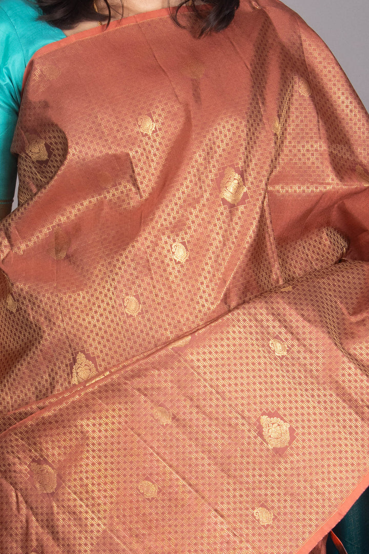 Copper Orange And Teal Blue Borderless Silk Saree