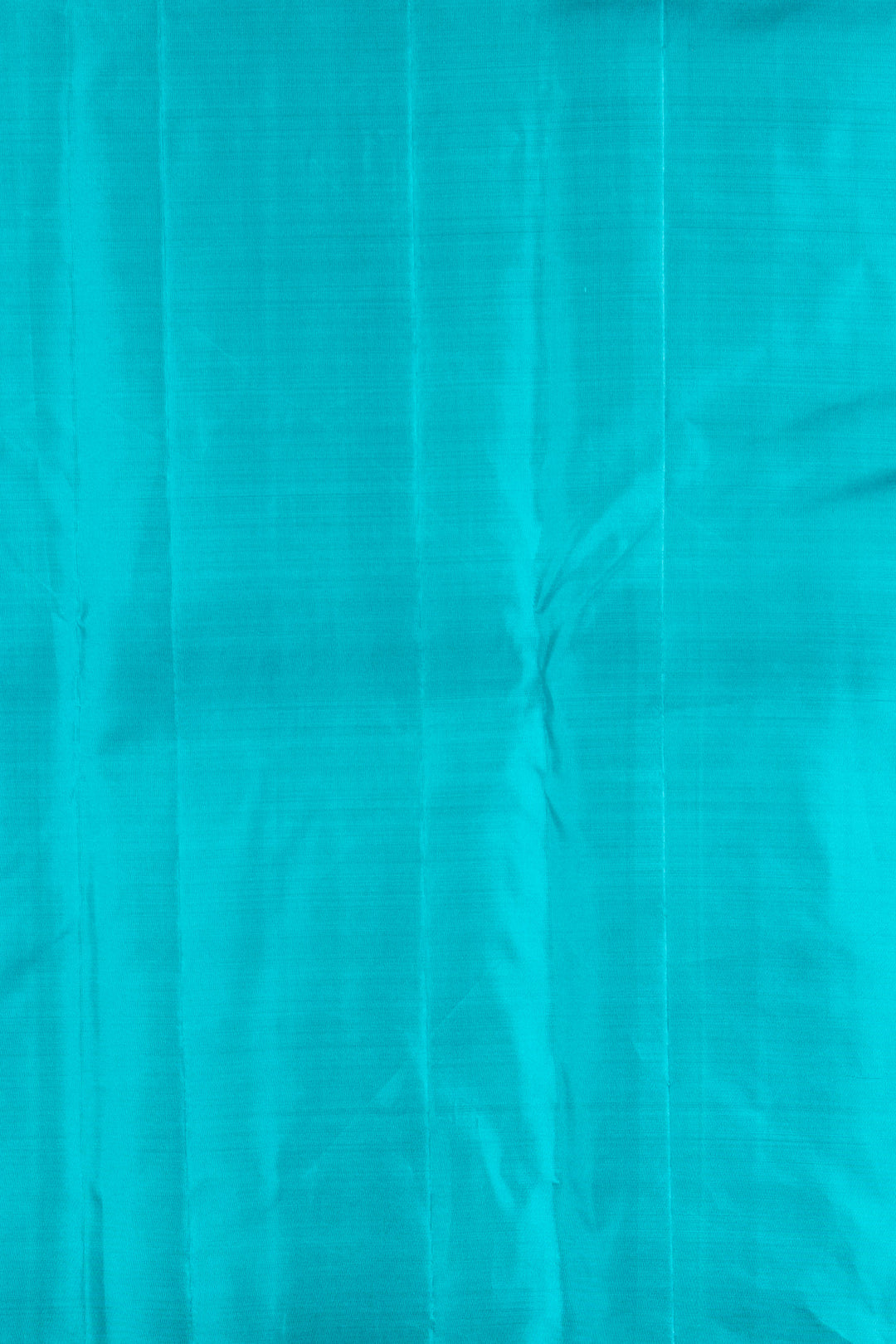 Copper Orange And Teal Blue Borderless Silk Saree