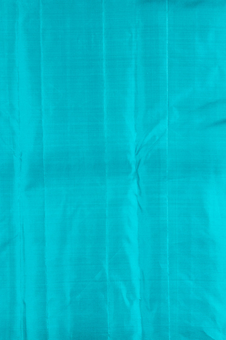 Copper Orange And Teal Blue Borderless Silk Saree