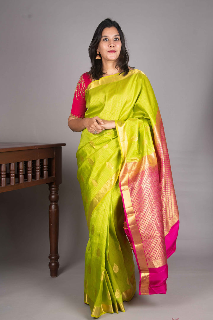 Leaf Green And Pink Vairaoosi Silk Saree