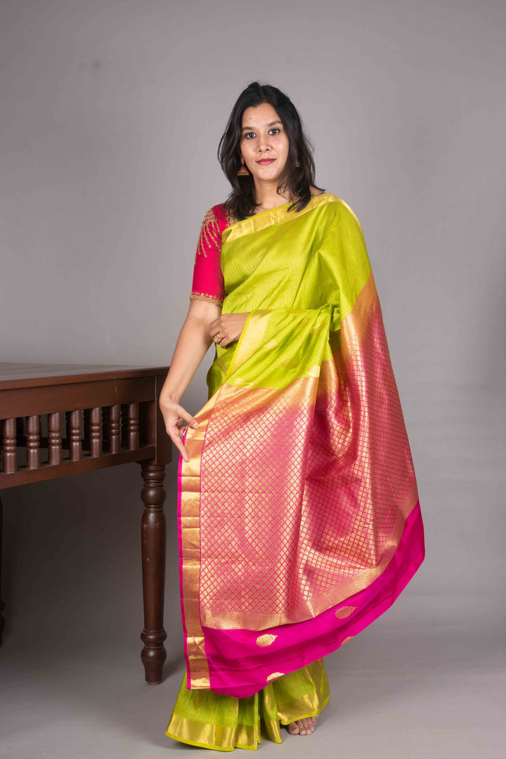 Leaf Green And Pink Vairaoosi Silk Saree