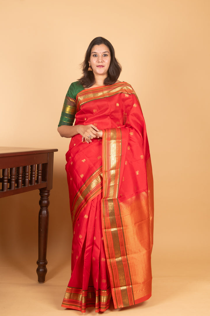 Bright Red and Dual tone Orange Pure Kanji silk saree