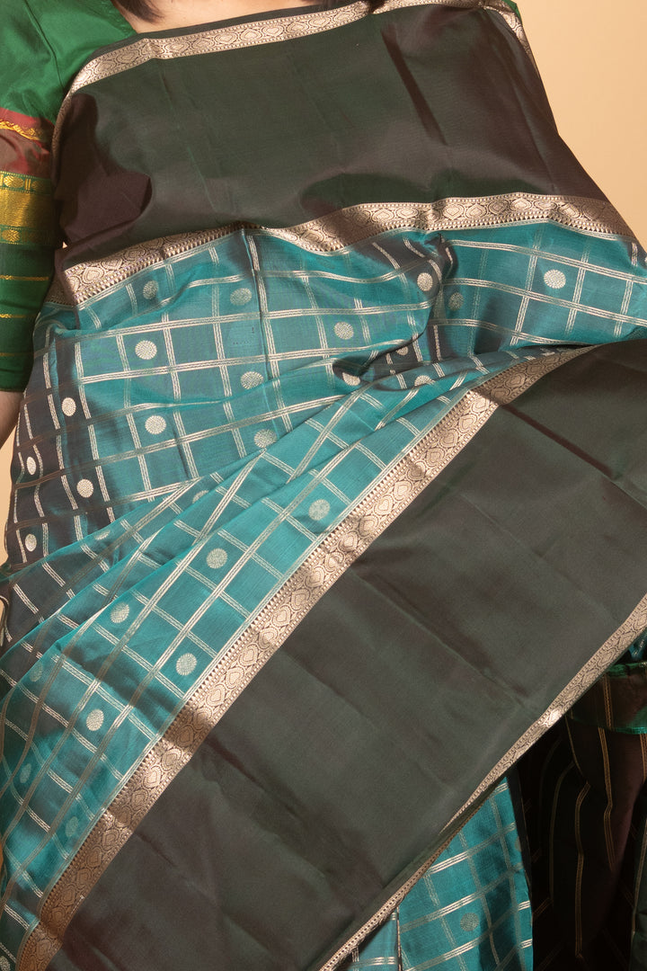 Teal and Bottle Green Zari Kattam Kanchi Silk saree