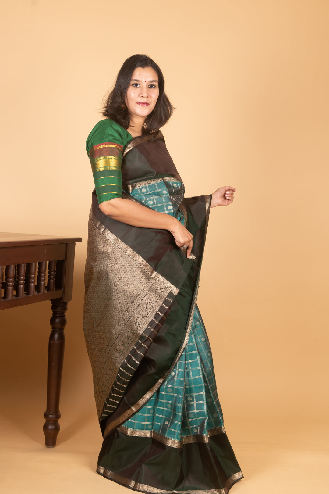 Teal and Bottle Green Zari Kattam Kanchi Silk saree