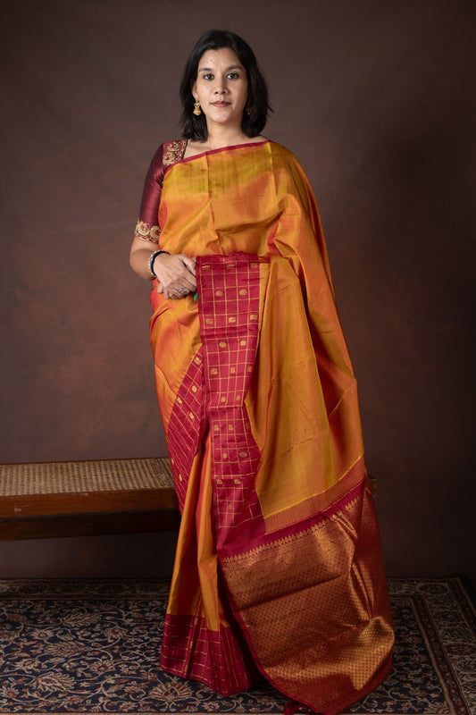 Dual tone orange small border silk saree