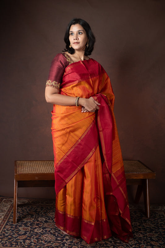 Golden orange pure silk saree