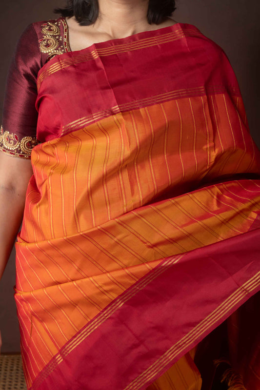 Golden orange pure silk saree