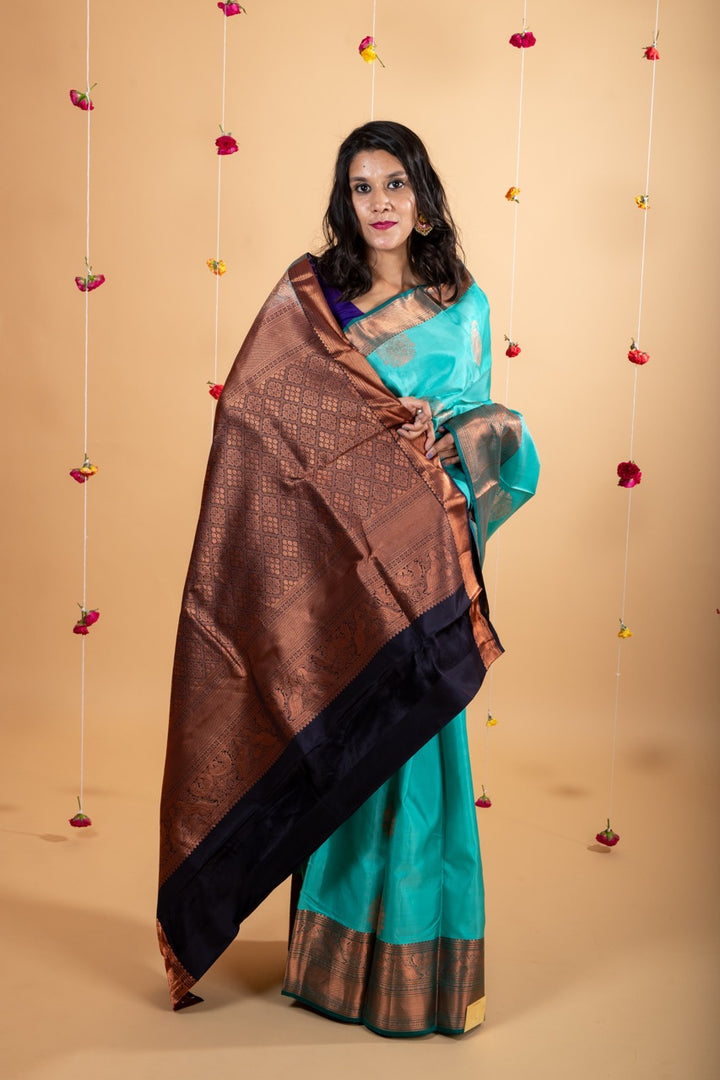 Turquoise pure silk saree