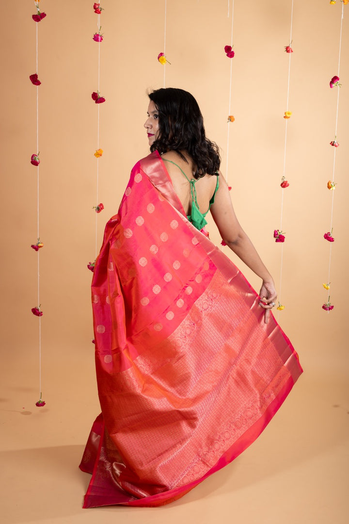 Pinkish orange pure silk saree