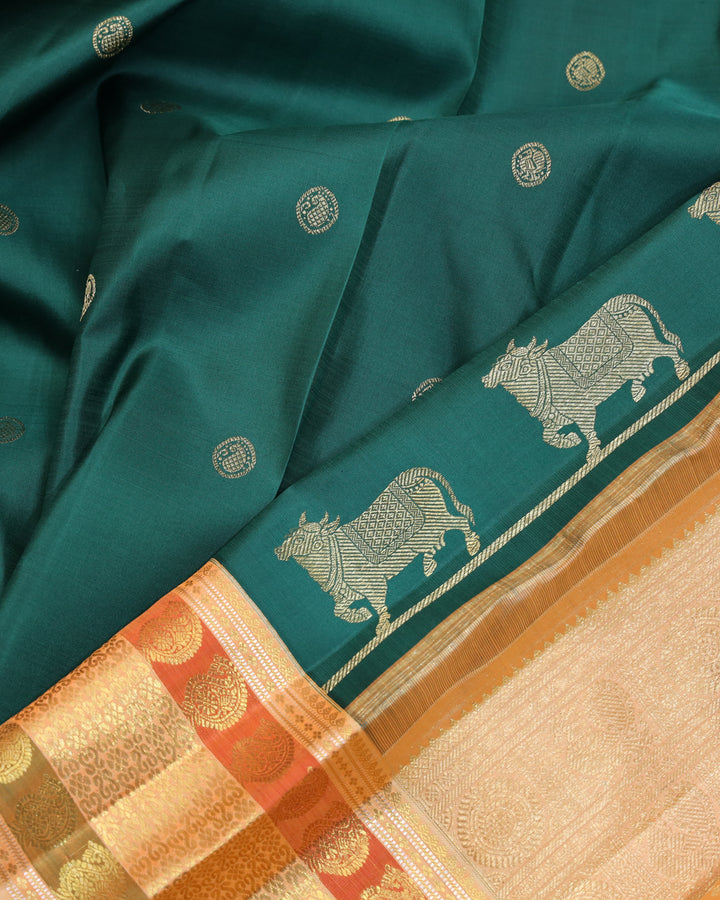 Pine green pure zari silk saree