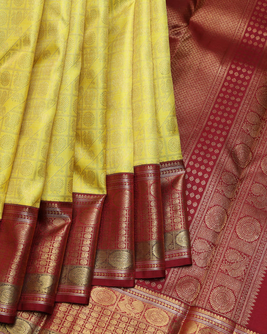 Lemon yellow and Maroon pure zari silk saree
