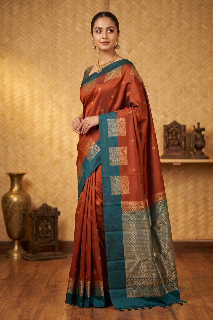 Rust and teal pure silk saree