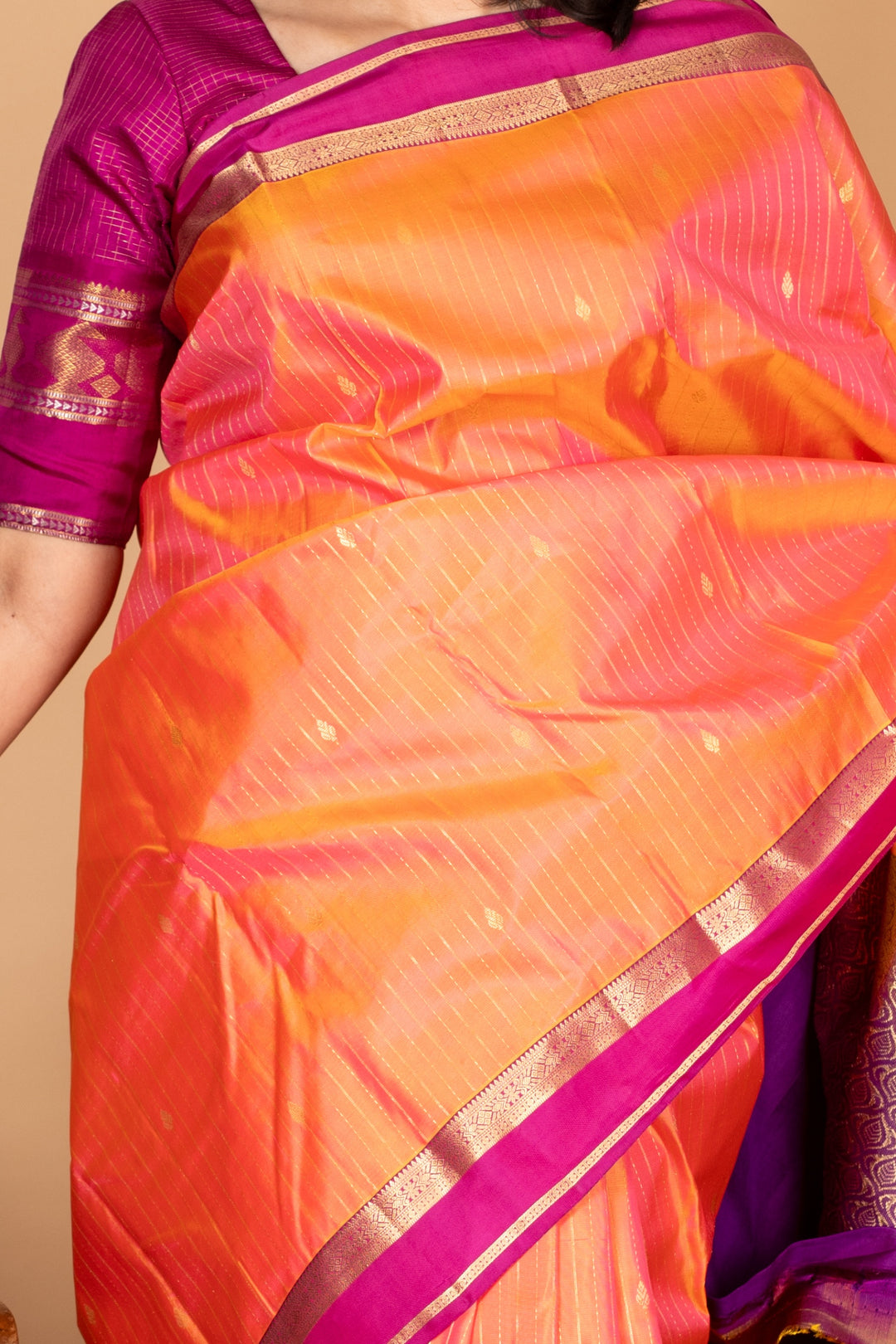 Dual tone orange small border silk saree