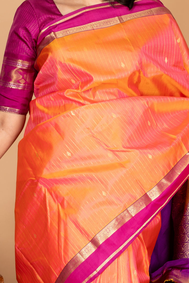 Dual tone orange small border silk saree
